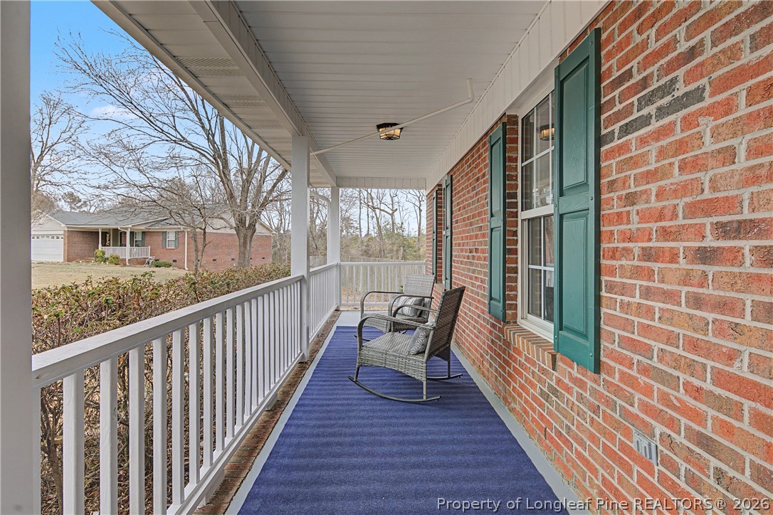 212 Finch Road Fayetteville, NC 28306 - Photo 3 of 50 Fresh paint on front porch floor and railings