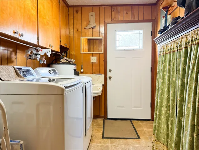 a utility room with a washer and dryer