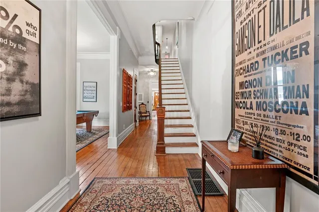 a room with stairs and furniture