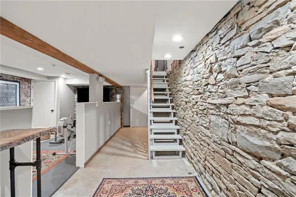 a view of entryway with wooden floor