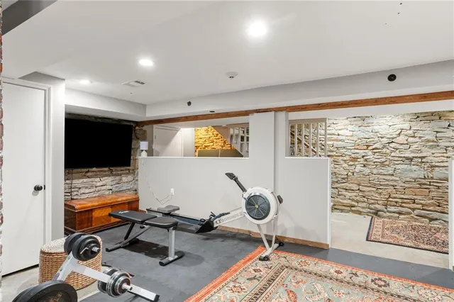 a workspace with furniture and rug