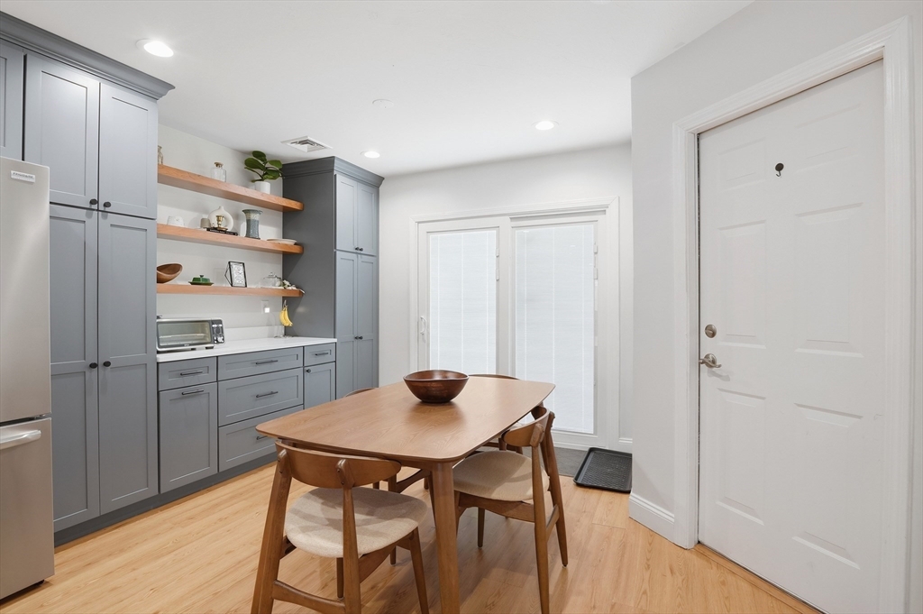 25 Greeley Street, Unit 2 Clinton, MA 01510 - Photo 14 of 33 a kitchen with a table and chairs in it