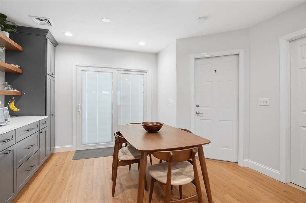 25 Greeley Street, Unit 2 Clinton, MA 01510 - Photo 15 of 33 a workspace with furniture and wooden floor