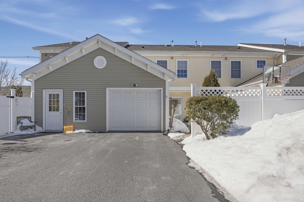25 Greeley Street, Unit 2 Clinton, MA 01510 - Photo 30 of 33 a view of a house with a outdoor space