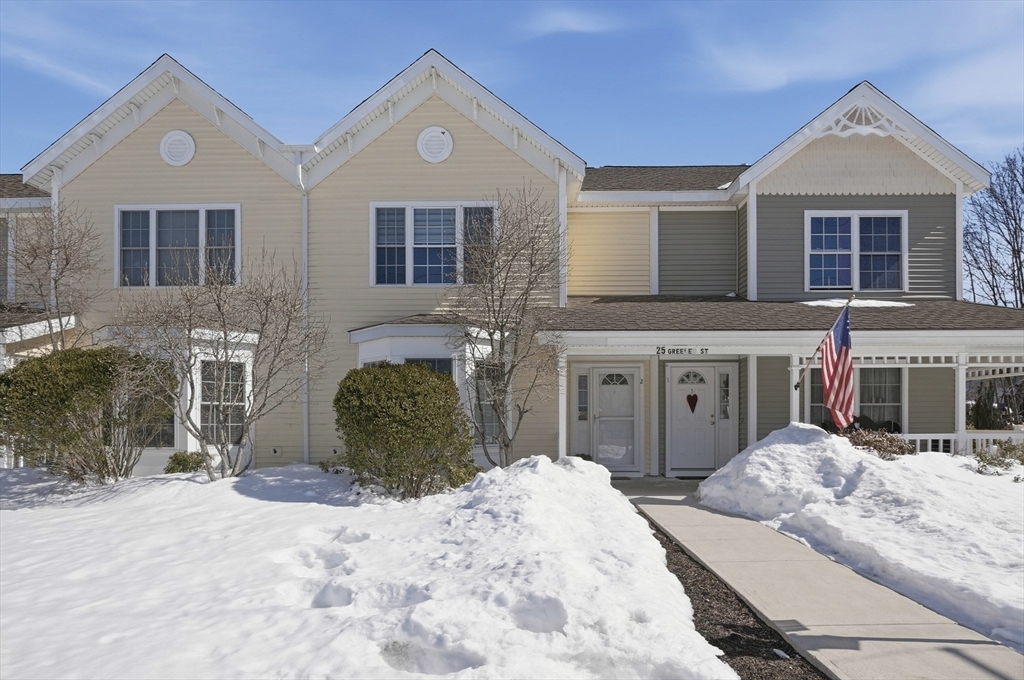 25 Greeley Street, Unit 2 Clinton, MA 01510 - Photo 3 of 33 a front view of a house with a bed