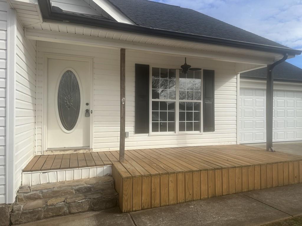 205 Daisy Lane Chatsworth, GA 30705 - Photo 4 of 34 a front view of a house with a window