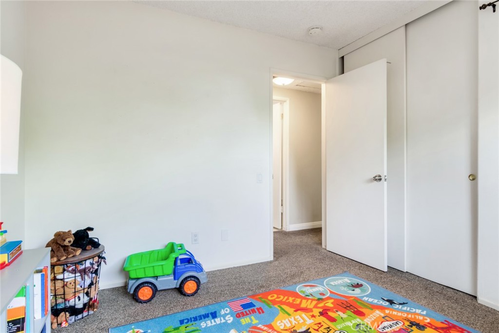 130 Sunridge Way Redlands, CA 92373 - Photo 23 of 35 Bedroom 2 (view to hall)