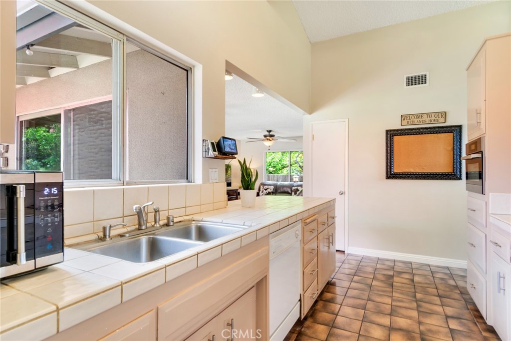 130 Sunridge Way Redlands, CA 92373 - Photo 10 of 35 Kitchen with view toward den