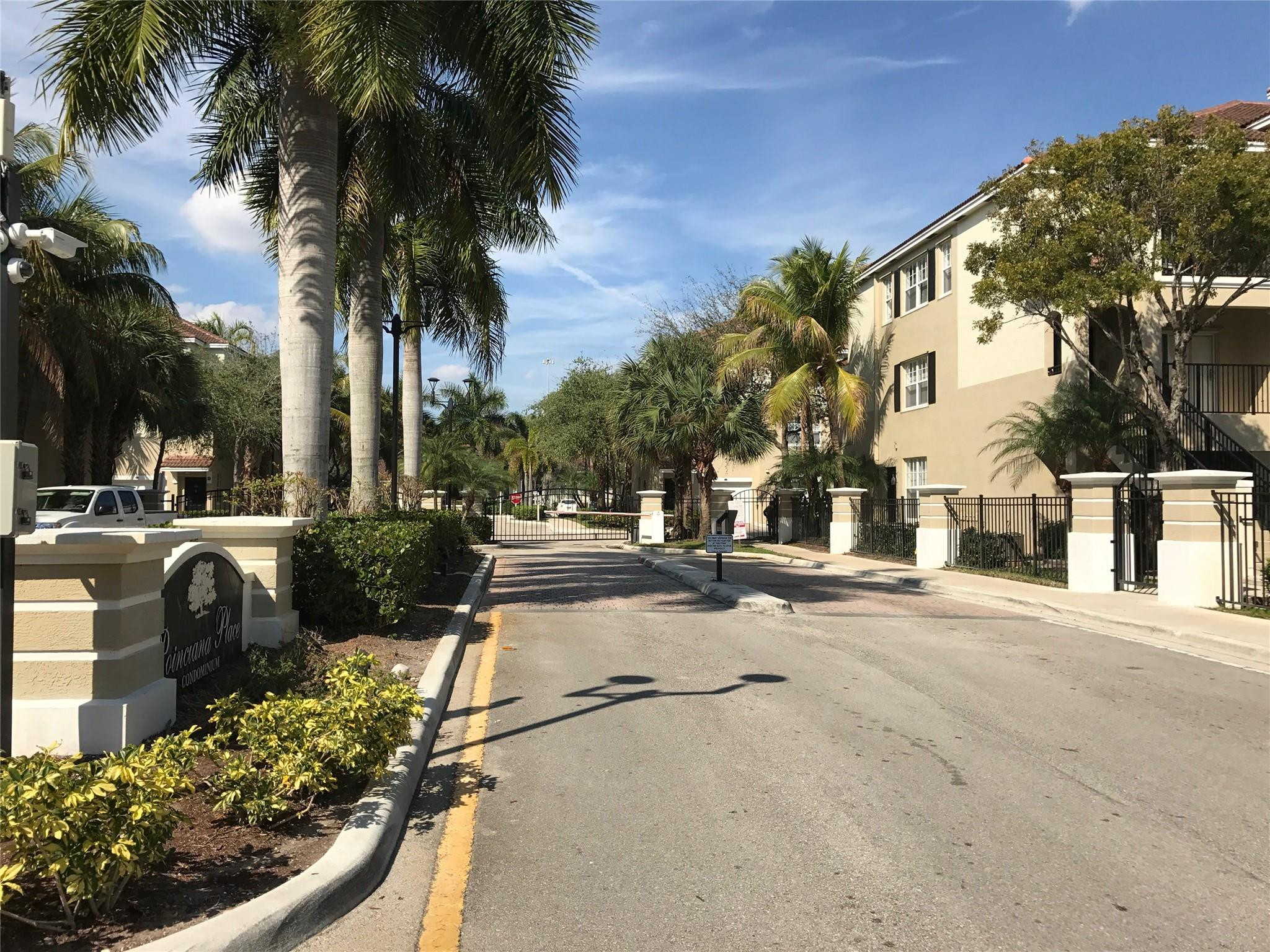 5800 West Sample Road, Unit 305 Coral Springs, FL 33067 - Photo 15 of 28 a view of a house with a patio