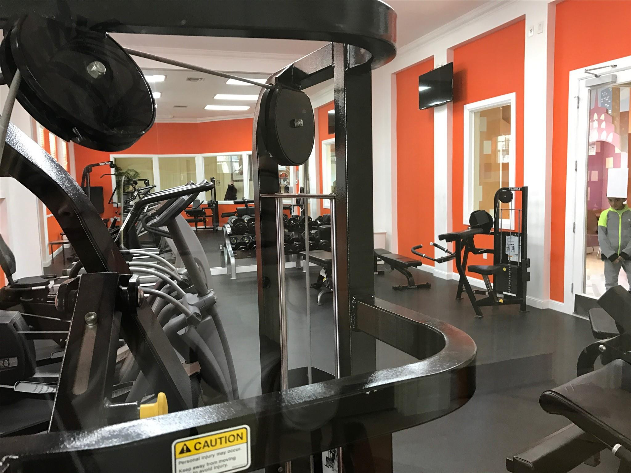 5800 West Sample Road, Unit 305 Coral Springs, FL 33067 - Photo 21 of 28 a view of gym equipment and outdoor seating