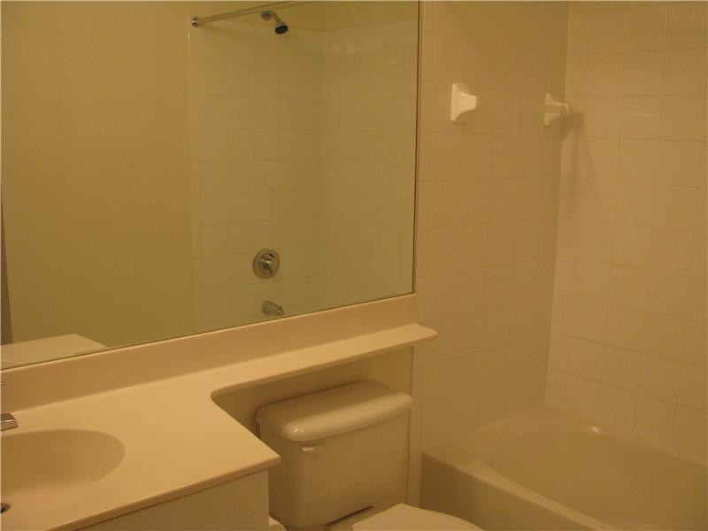 5800 West Sample Road, Unit 305 Coral Springs, FL 33067 - Photo 9 of 28 a bathroom with a toilet and a sink