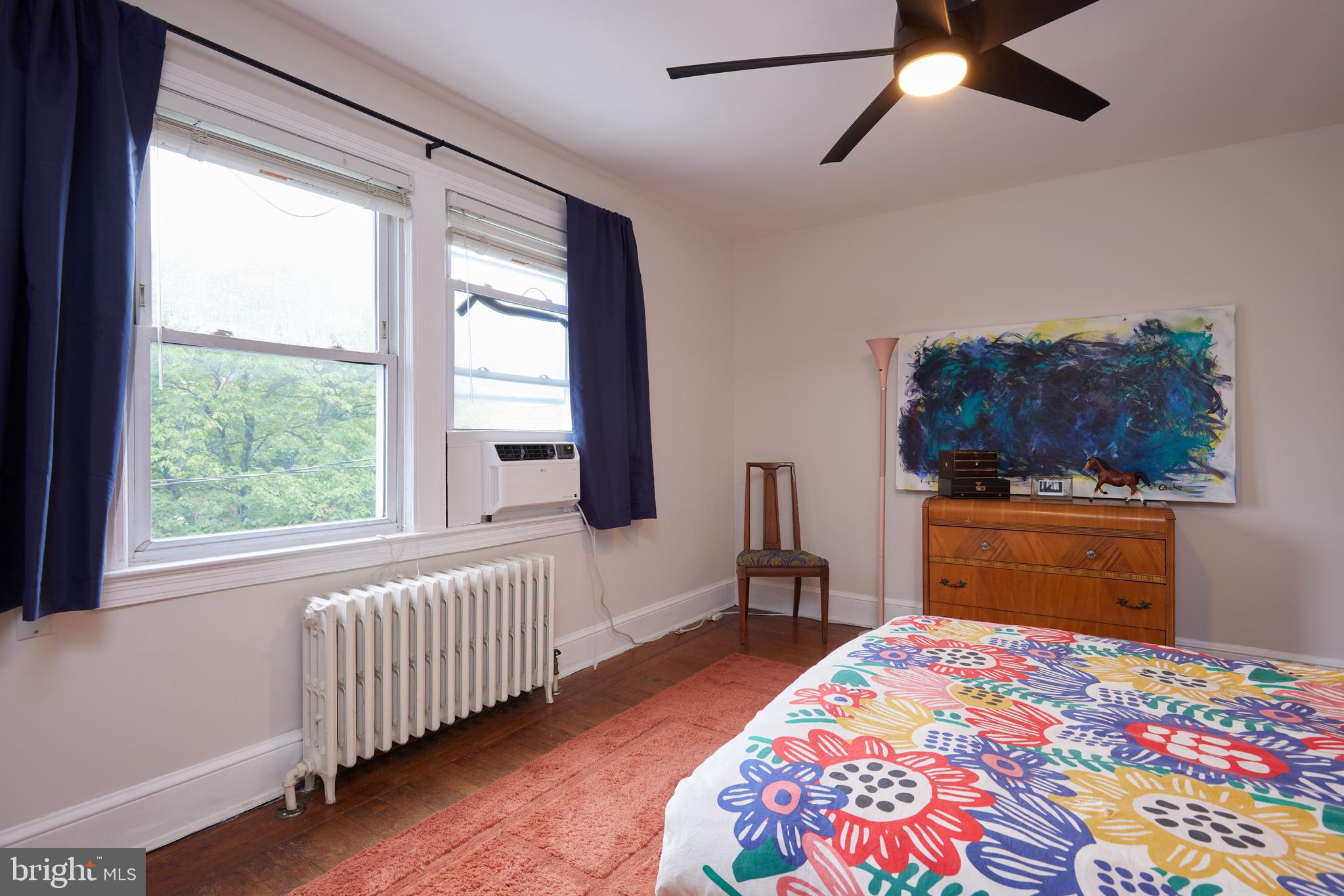 5417 4th Street Northwest Washington, DC 20011 - Photo 17 of 29 a bedroom with a bed and a dresser