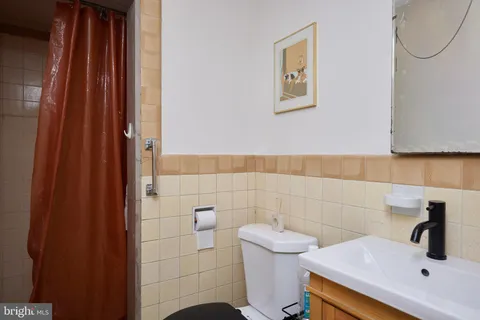 a bathroom with a sink and a toilet