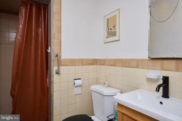 a bathroom with a sink and a toilet