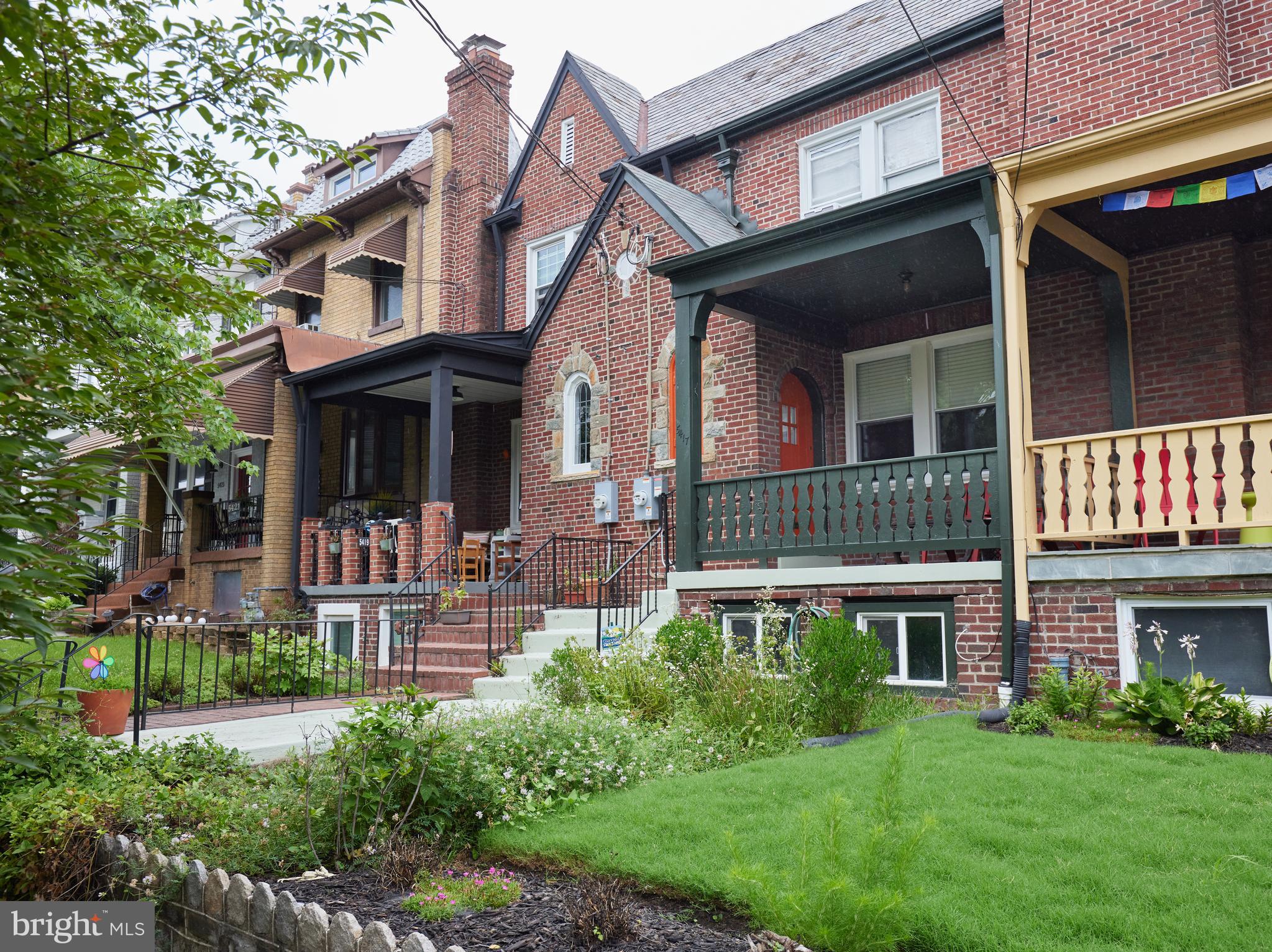 5417 4th Street Northwest Washington, DC 20011 - Photo 2 of 29 front view of a brick house with a yard