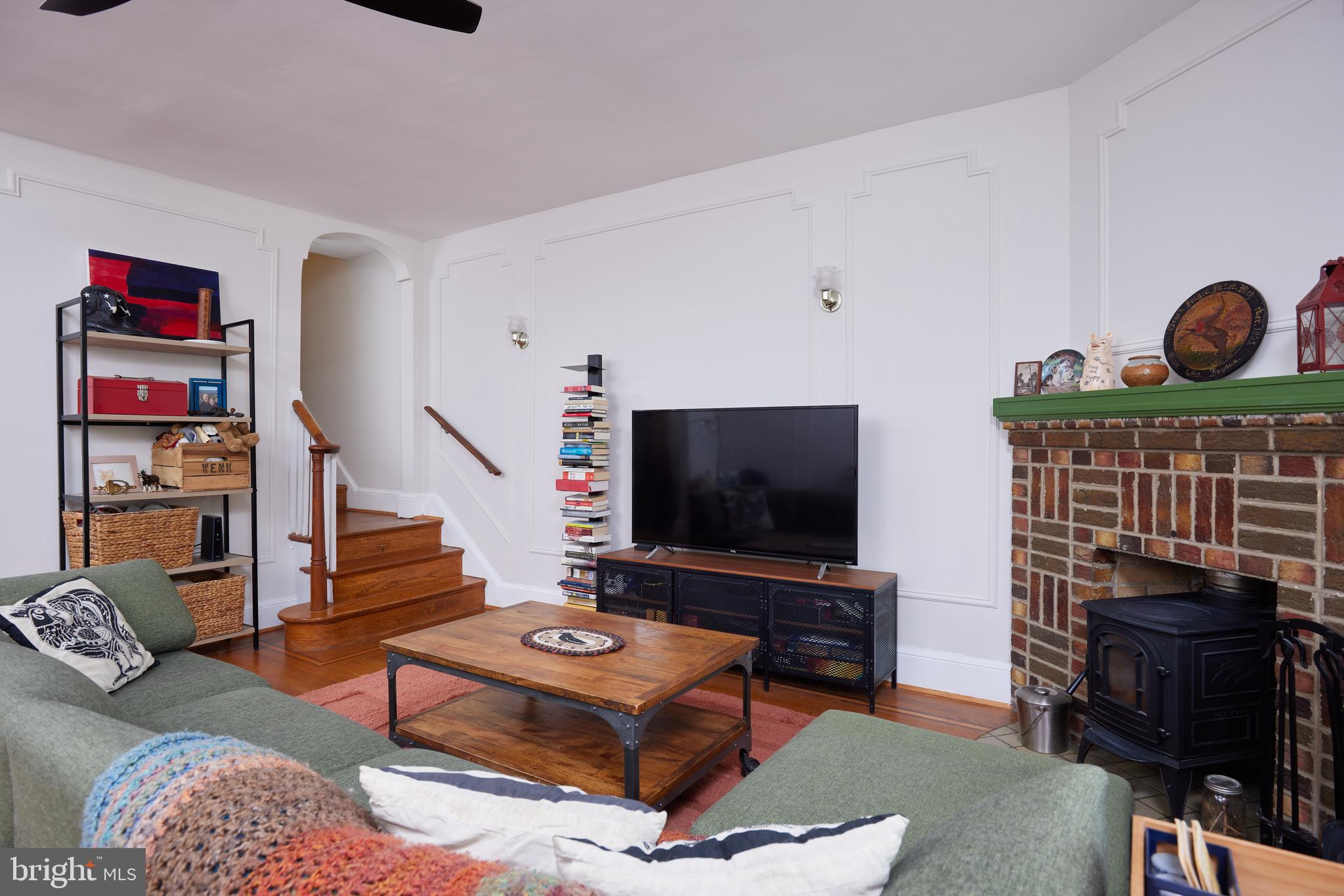 5417 4th Street Northwest Washington, DC 20011 - Photo 4 of 29 a living room with furniture and a flat screen tv