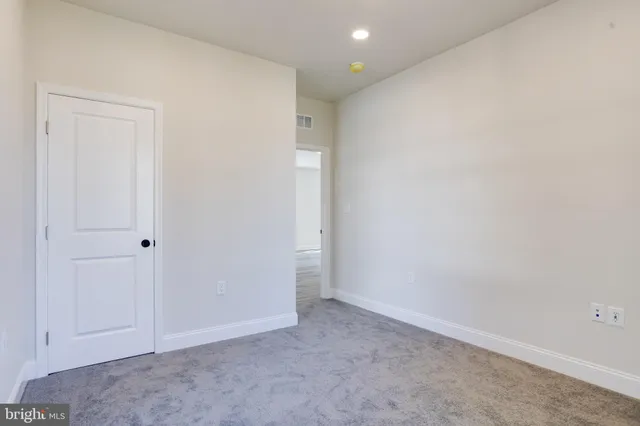 a view of entryway with a front door