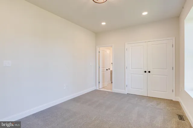 a view of front of a house with a yard