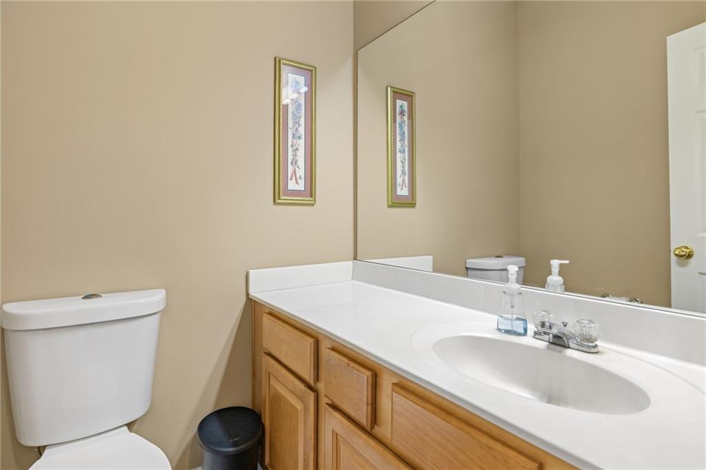 7913 Pea Ridge Road Lula, GA 30554 - Photo 20 of 51 a bathroom with a sink and a toilet
