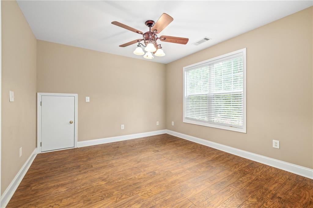7913 Pea Ridge Road Lula, GA 30554 - Photo 23 of 51 a view of an empty room with a window