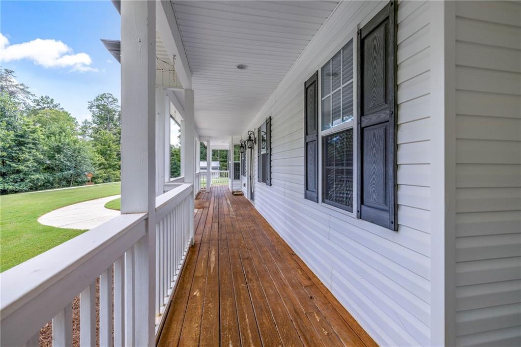 7913 Pea Ridge Road Lula, GA 30554 - Photo 32 of 51 a view of a house with pool