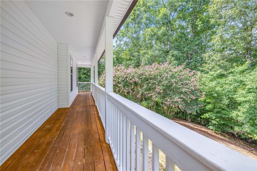 7913 Pea Ridge Road Lula, GA 30554 - Photo 33 of 51 a view of balcony with wooden floor