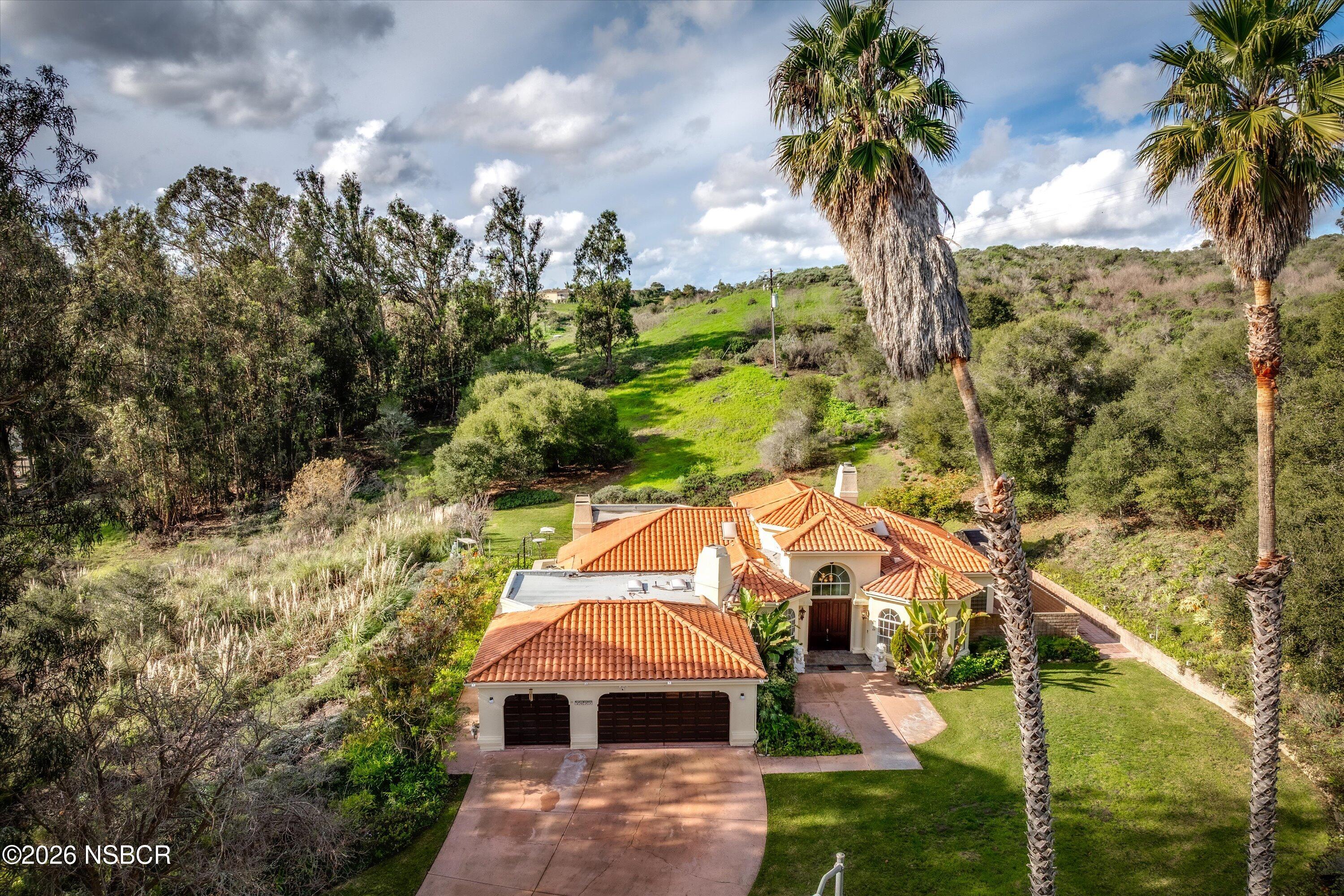2655 Adobe Falls Road Lompoc, CA 93436 - Photo 1 of 51 a aerial view of a house with a yard and balcony