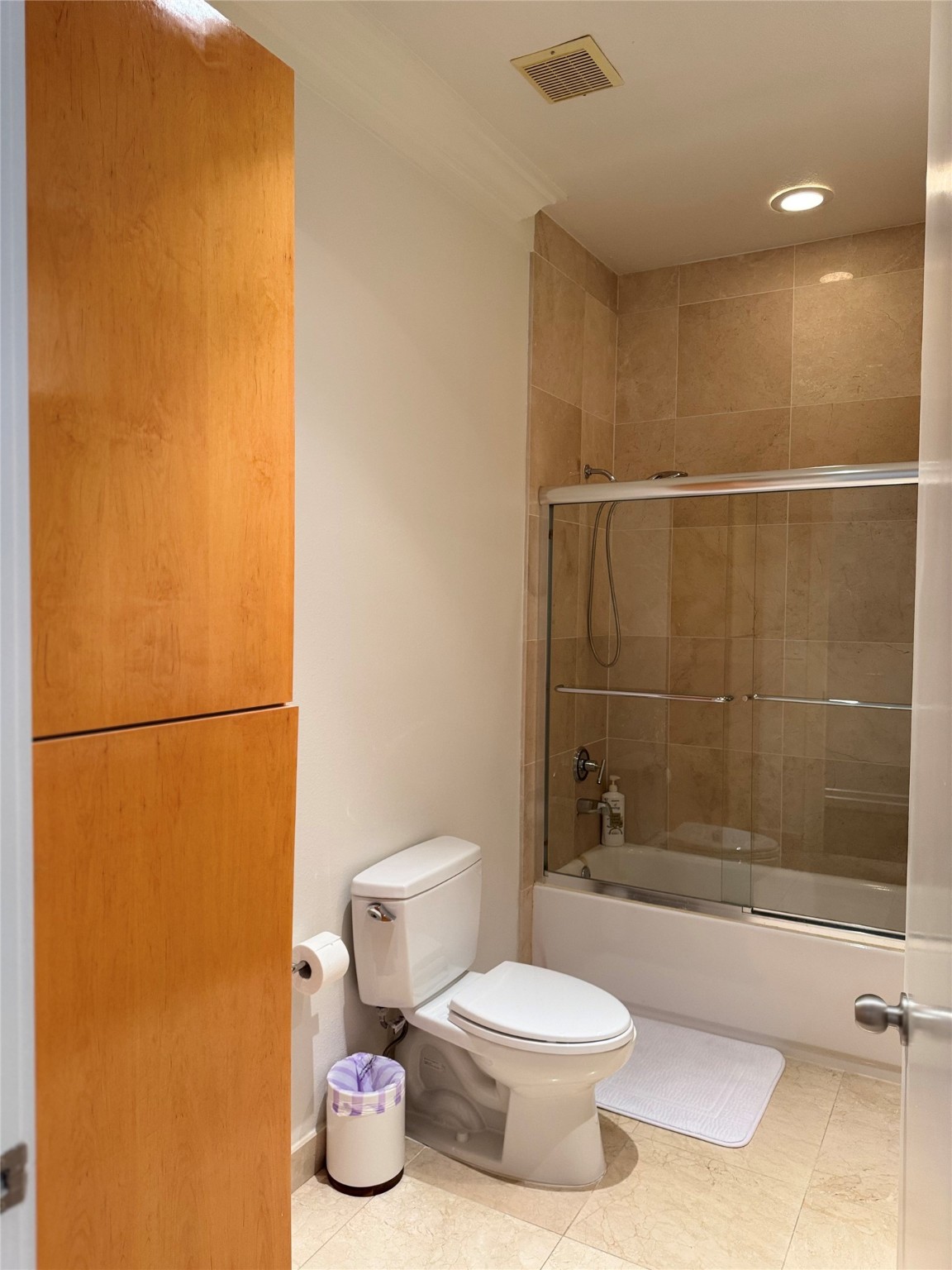 3388 Sage Road, Unit 101 Houston, TX 77056 - Photo 30 of 32 a bathroom with a toilet and a shower