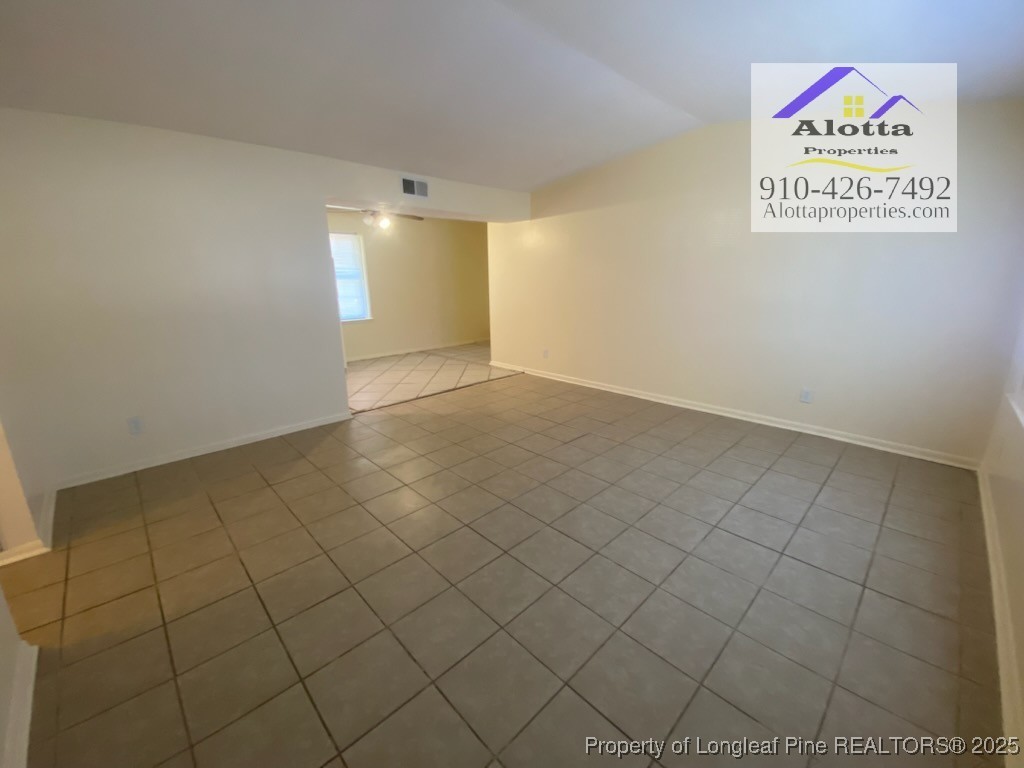 2196 Delta Drive Fayetteville, NC 28304 - Photo 2 of 12 an empty room with windows