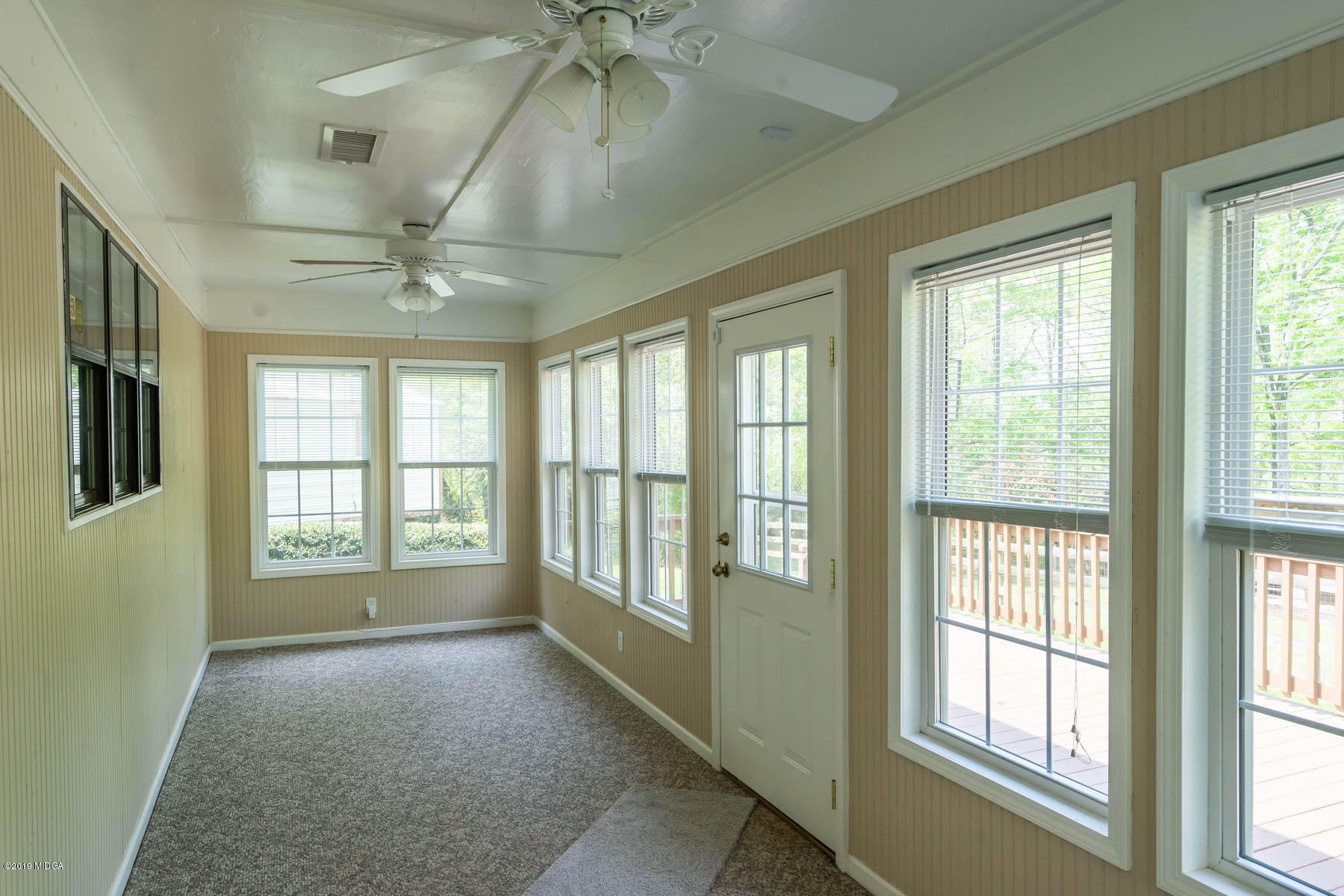 6579 New Forsyth Road Macon, GA 31210 - Photo 1 of 27 a view of an empty room with a window