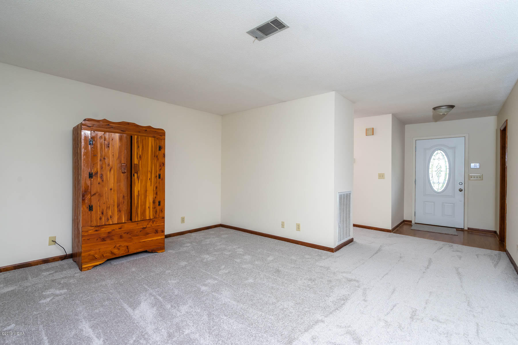 6579 New Forsyth Road Macon, GA 31210 - Photo 23 of 27 an empty room with closet area