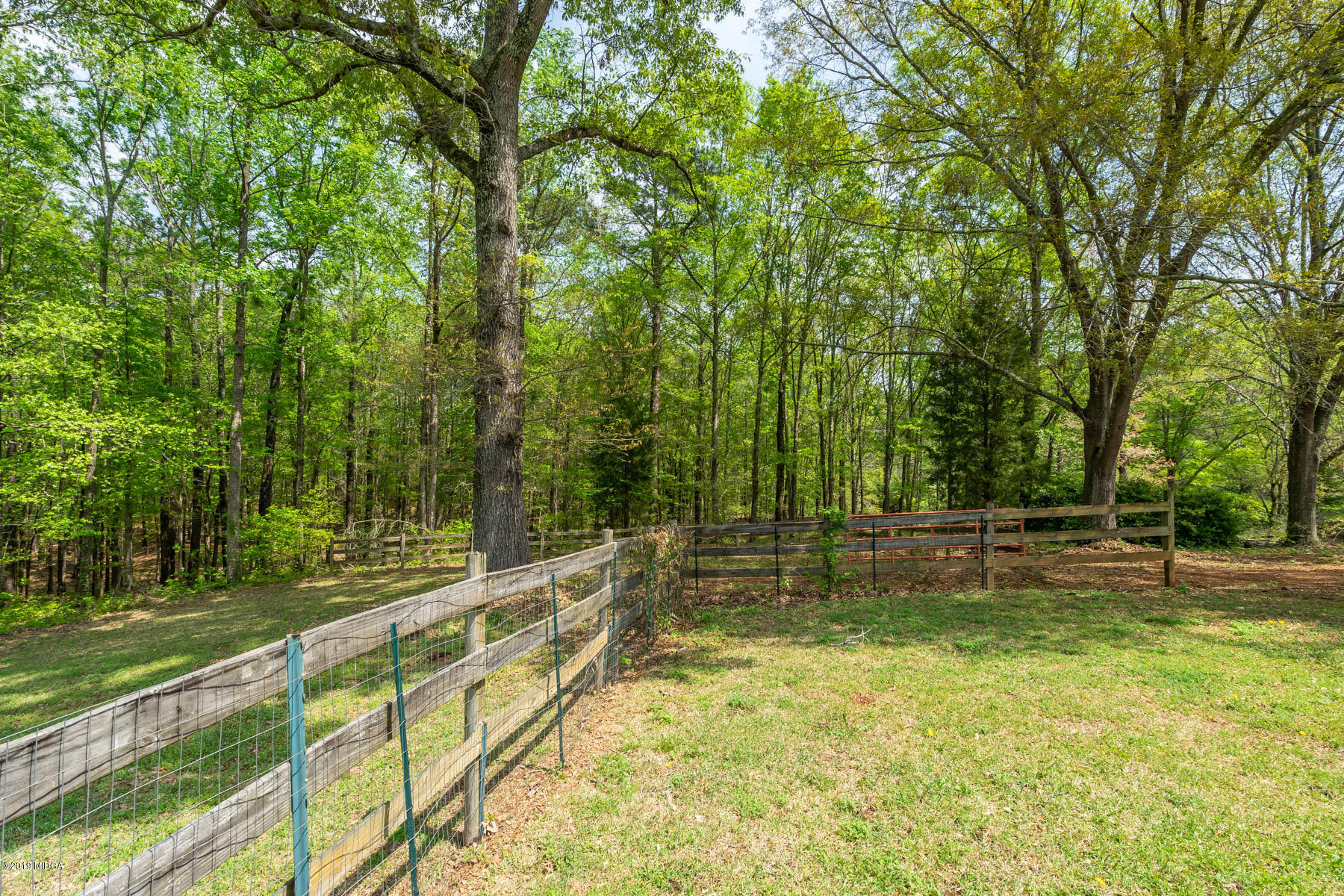 6579 New Forsyth Road Macon, GA 31210 - Photo 7 of 27 a view of a swimming pool with a yard