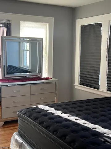 a room that has a dresser