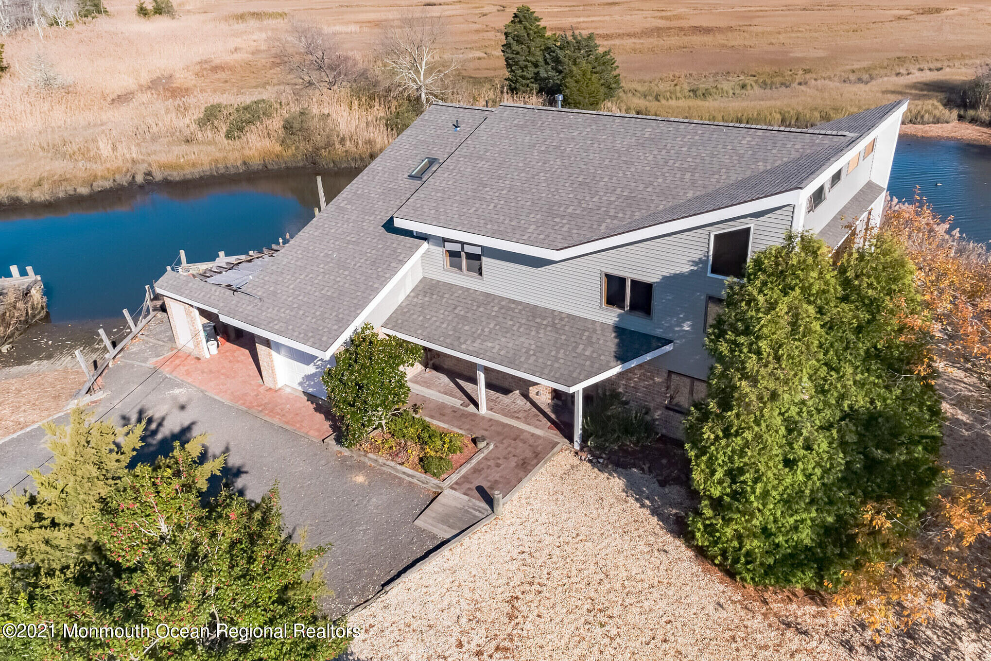 97 Edgewater Drive Tuckerton, NJ 08087 - Photo 2 of 41 an aerial view of a house with a yard and mountain view in back