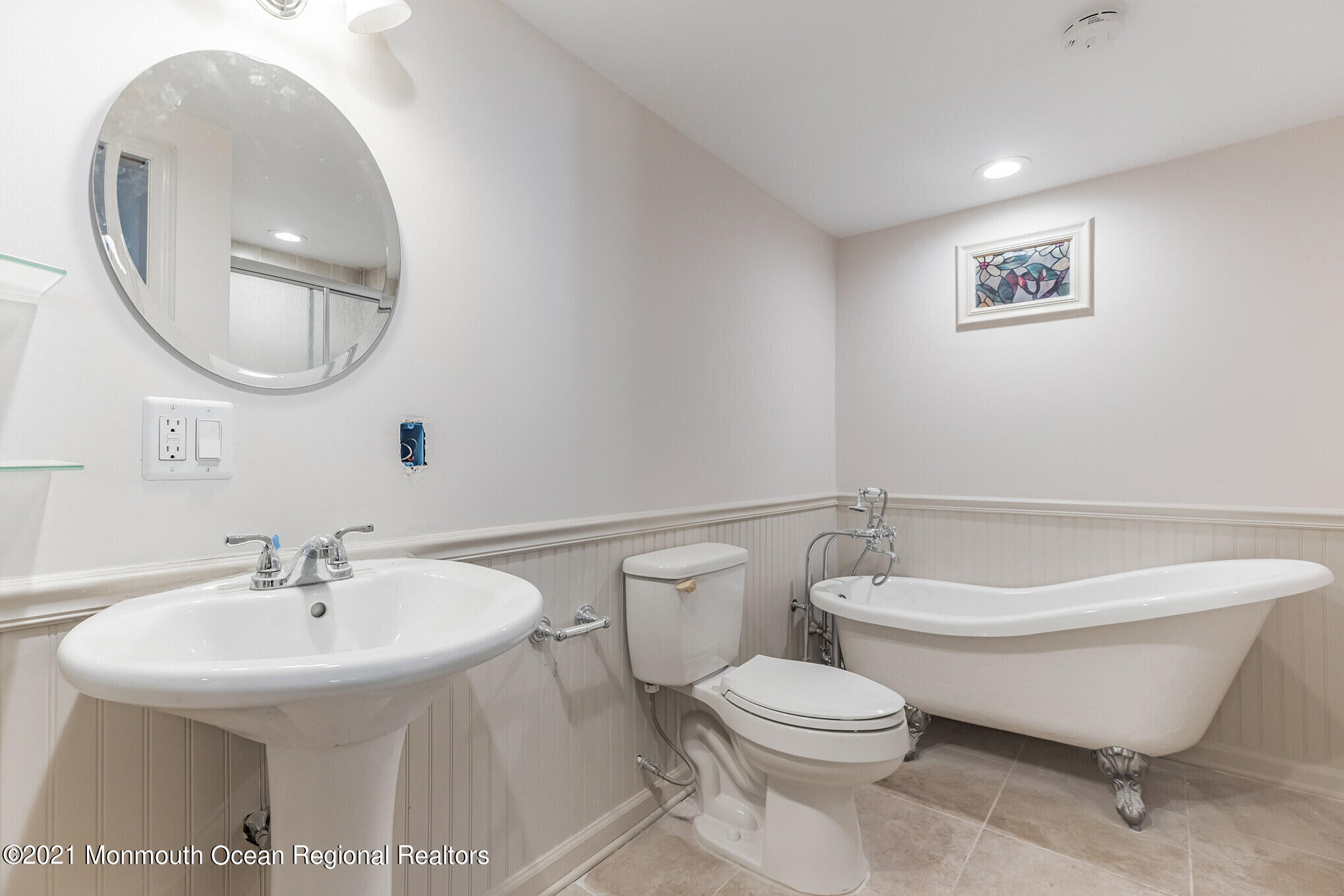 97 Edgewater Drive Tuckerton, NJ 08087 - Photo 17 of 41 a bathroom with a toilet sink and mirror