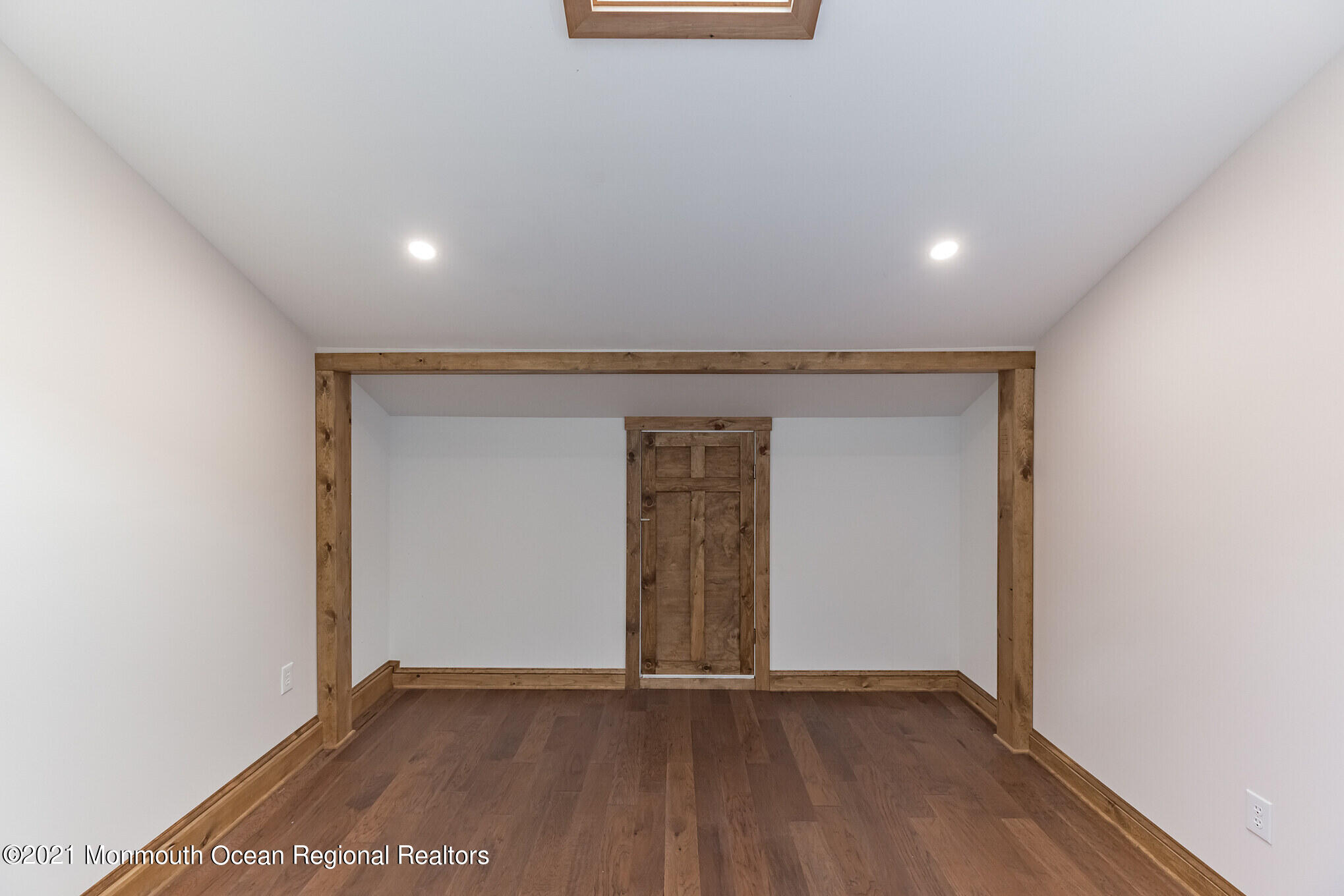 97 Edgewater Drive Tuckerton, NJ 08087 - Photo 25 of 41 an empty room with wooden floor and windows