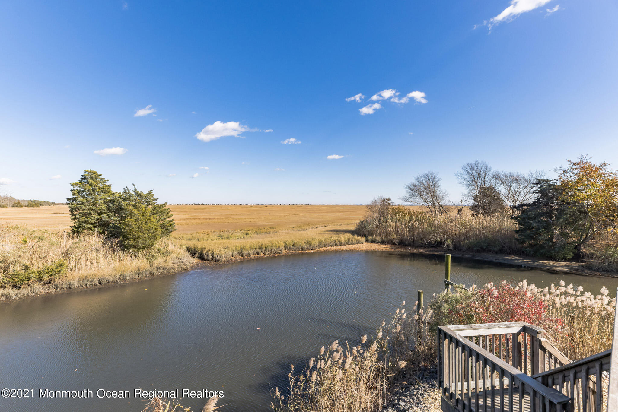 97 Edgewater Drive Tuckerton, NJ 08087 - Photo 5 of 41 a view of a lake from a balcony