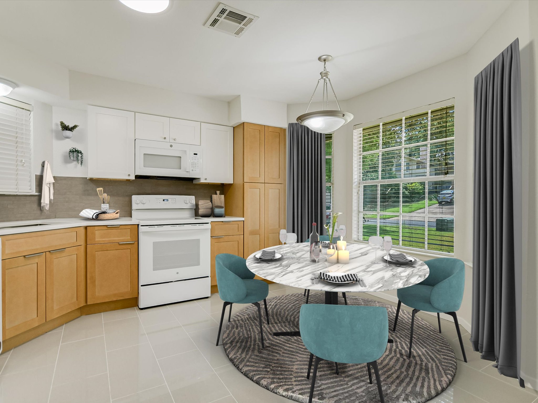 1704 Waterloo Trail, Unit B Austin, TX 78704 - Photo 4 of 10 Kitchen featuring white appliances, light countertops, light tile patterned flooring, decorative backsplash, and decorative light fixtures