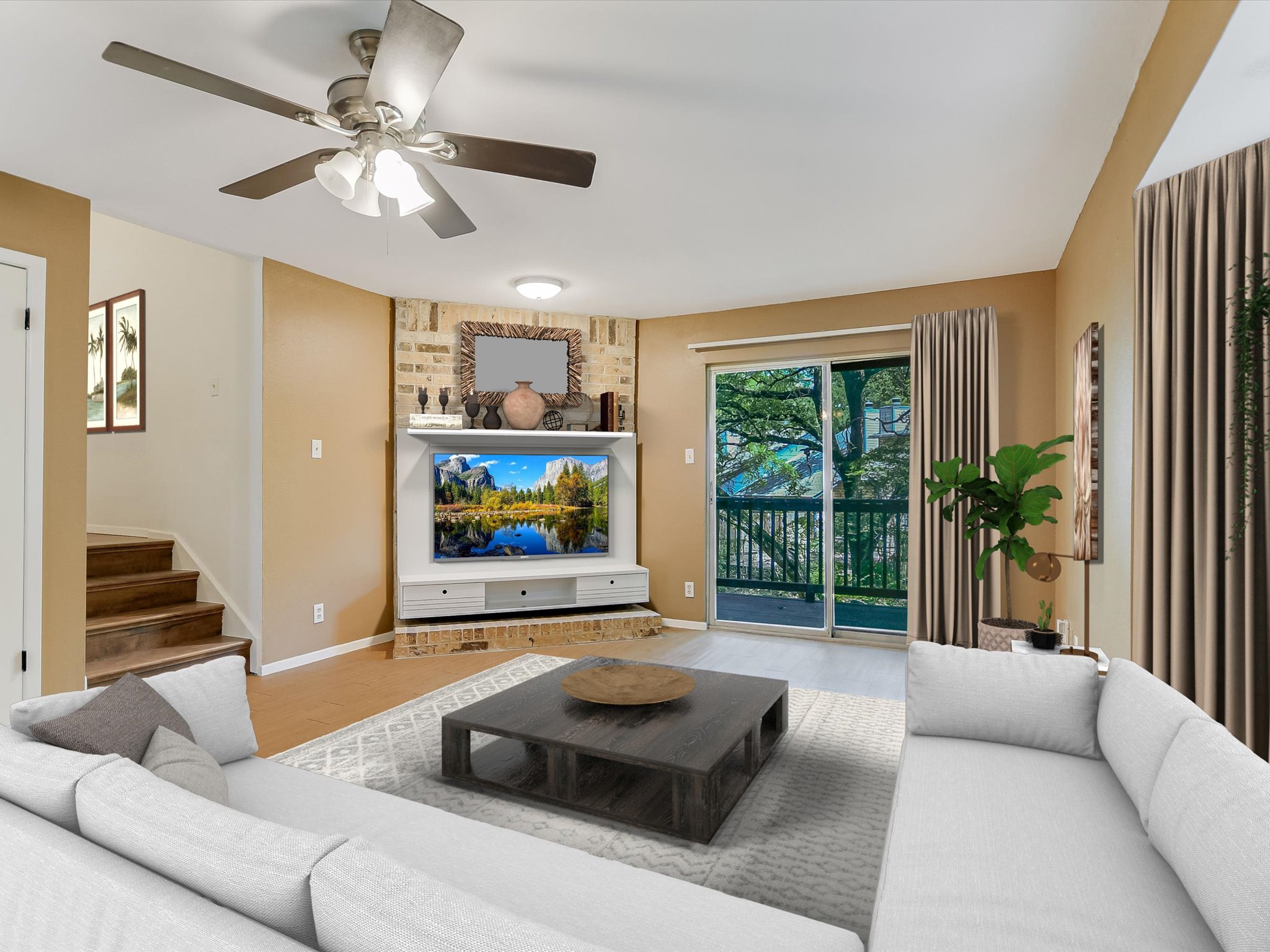 1704 Waterloo Trail, Unit B Austin, TX 78704 - Photo 7 of 10 Living area featuring ceiling fan and wood finished floors