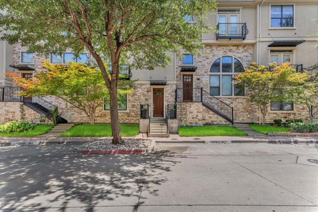 5744 Robbie Road Plano, TX 75024 - Photo 2 of 32 Multi-story townhome exterior featuring stone and stucco finishes