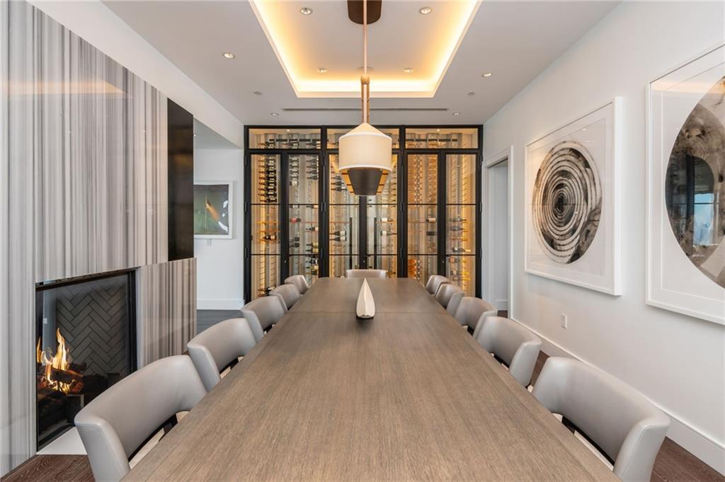 3376 Peachtree Road Northeast, Unit PH51 Atlanta, GA 30326 - Photo 15 of 43 a living room with furniture and a large window