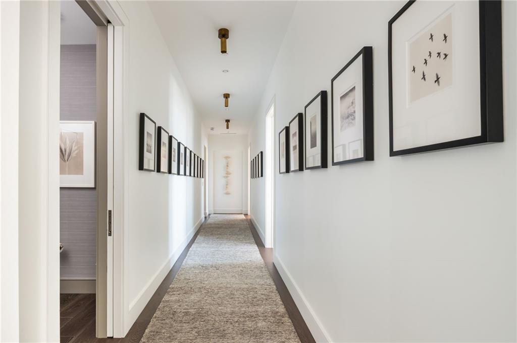 3376 Peachtree Road Northeast, Unit PH51 Atlanta, GA 30326 - Photo 22 of 43 a view of a hallway with windows