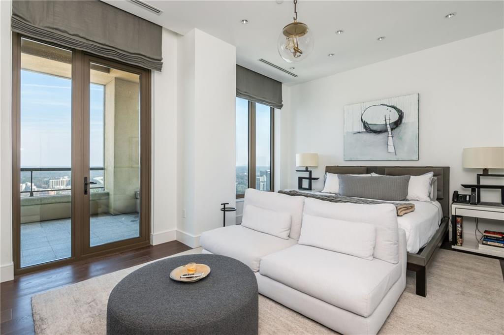 3376 Peachtree Road Northeast, Unit PH51 Atlanta, GA 30326 - Photo 23 of 43 a bedroom with bed and window