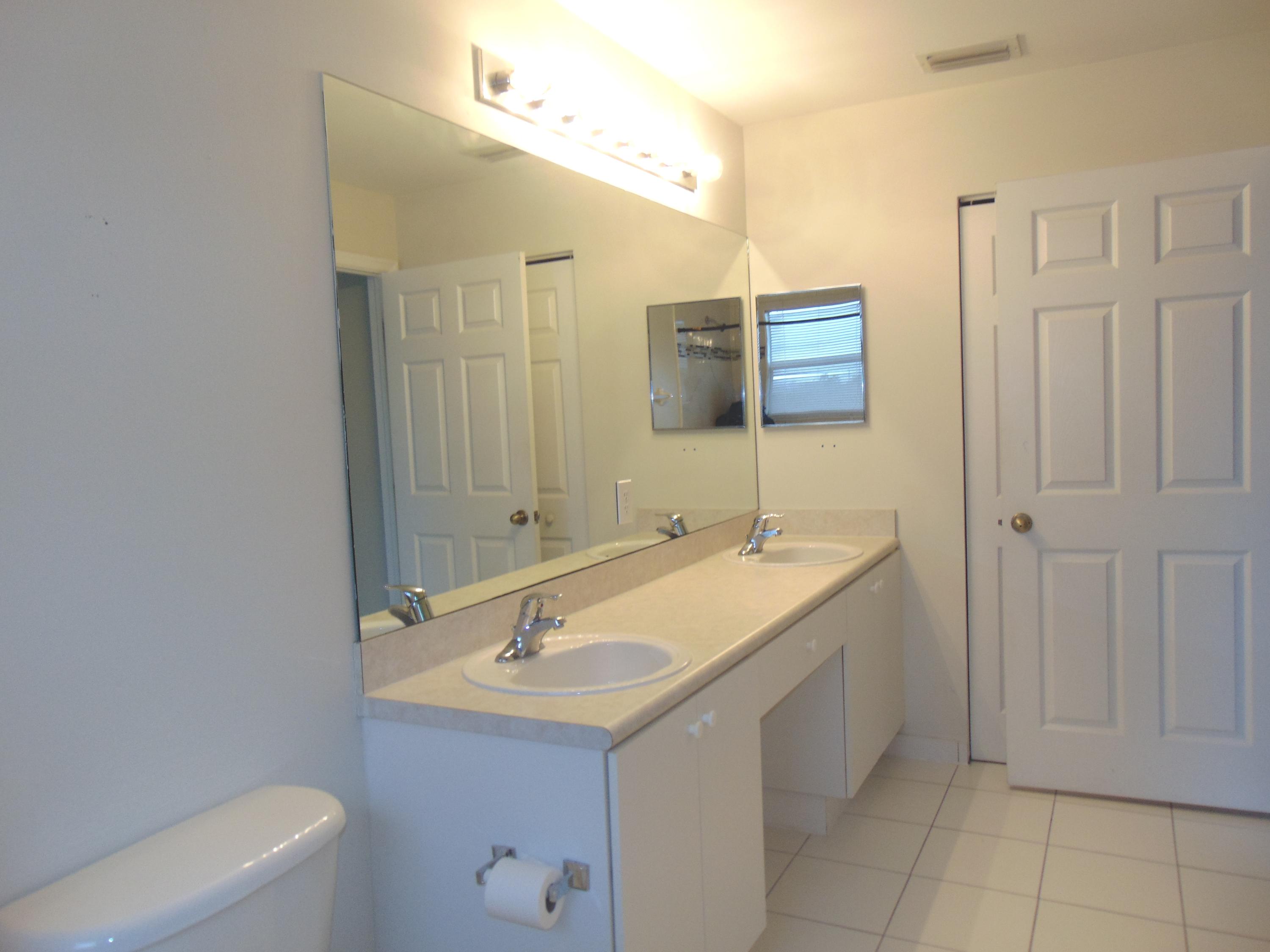 1060 Imperial Lake Road, Unit 360 West Palm Beach, FL 33413 - Photo 21 of 33 Imperial guest bath2