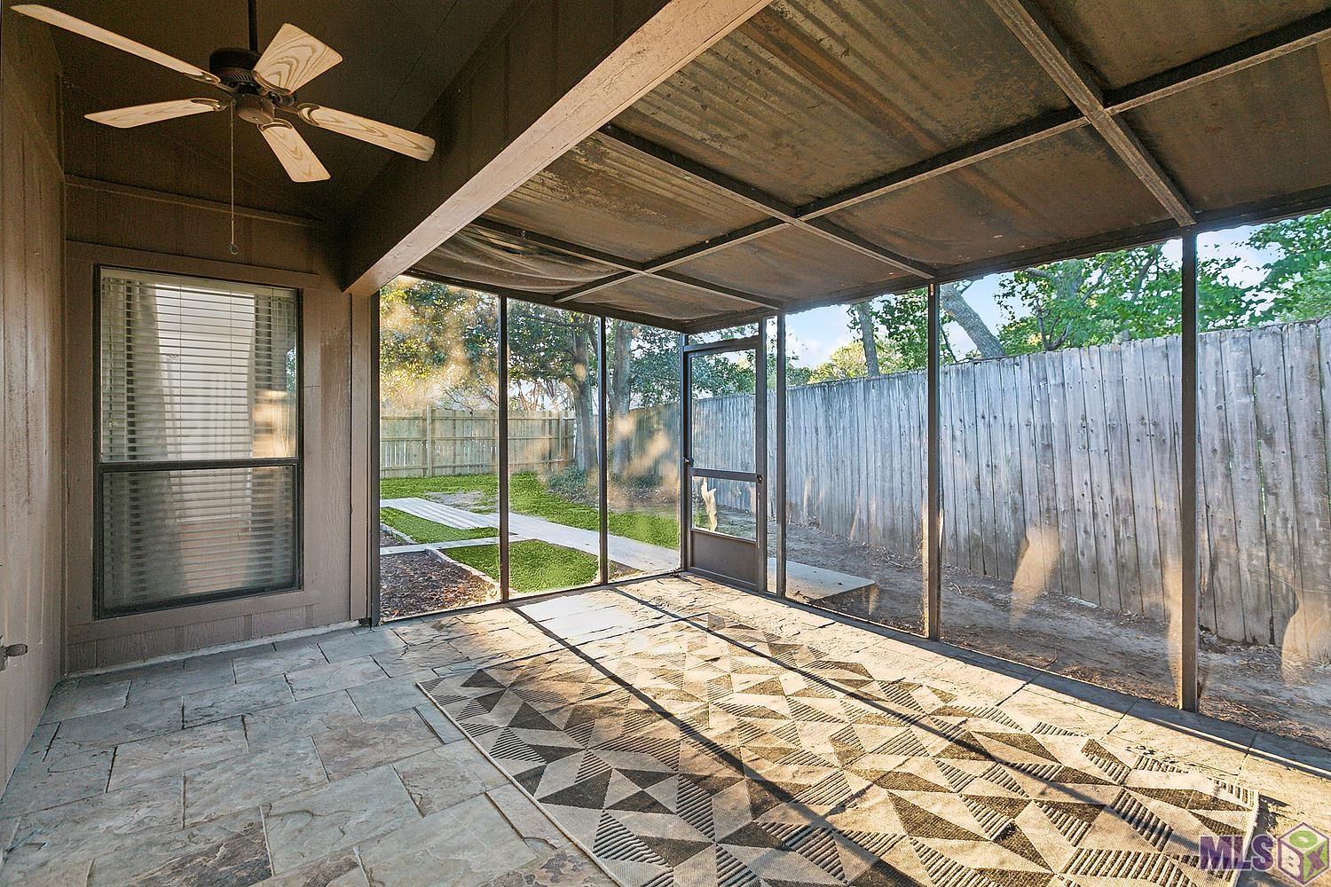 2411 Inverrary Drive Baton Rouge, LA 70816 - Photo 12 of 17 Screened porch