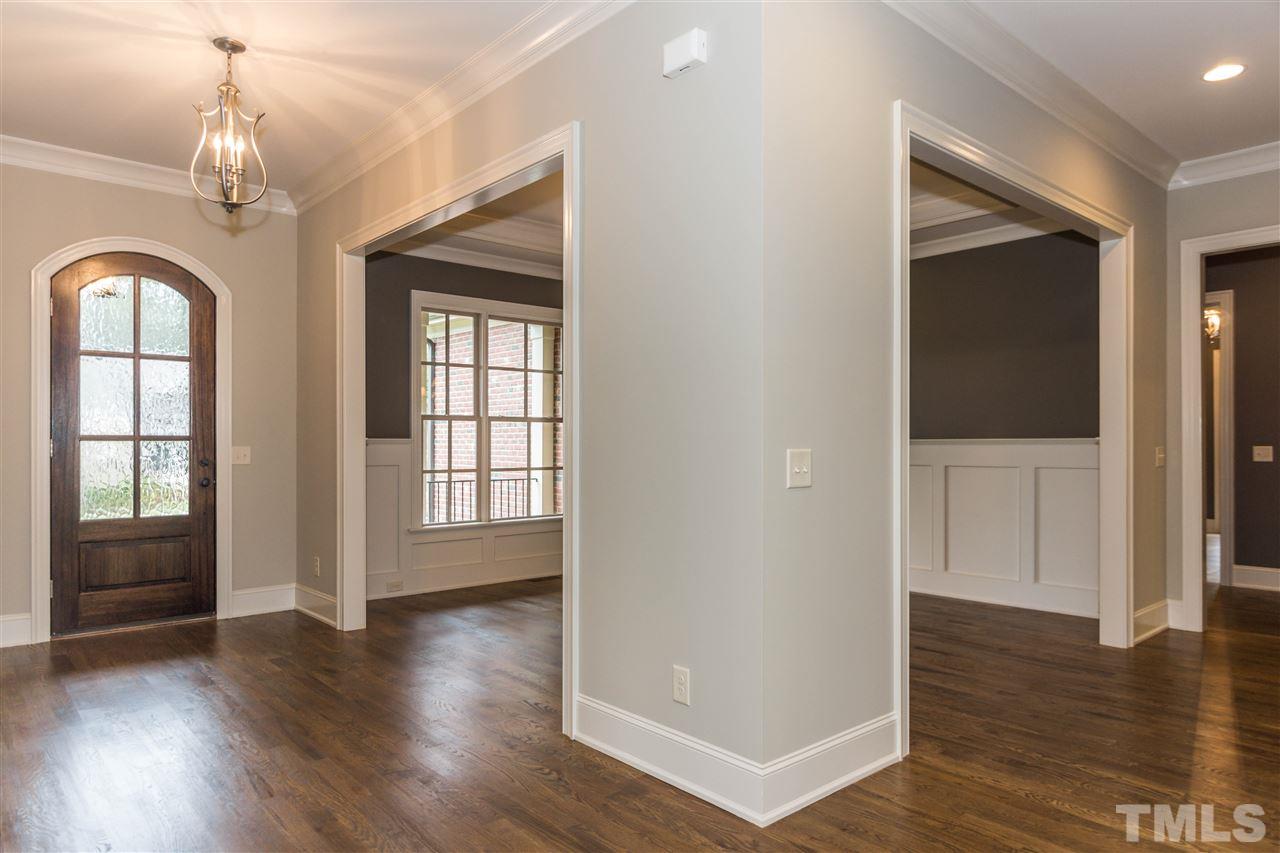 6901 Bartons Bend Way, Unit 25 Raleigh, NC 27614 - Photo 1 of 3 wooden floor in an empty room with a window