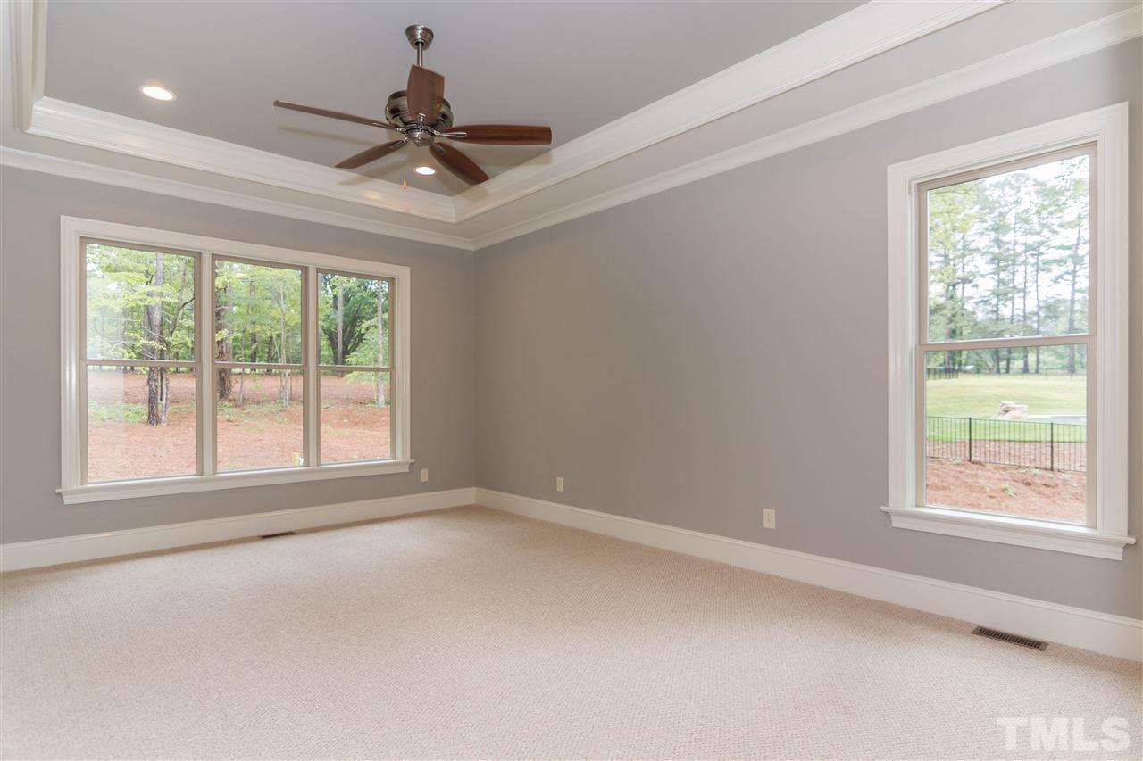 6901 Bartons Bend Way, Unit 25 Raleigh, NC 27614 - Photo 2 of 3 a view of empty room with ceiling fan