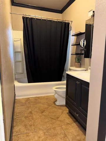 a bathroom with a sink a toilet and vanity