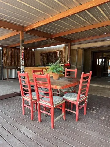 a view of a swimming pool with a lounge chairs