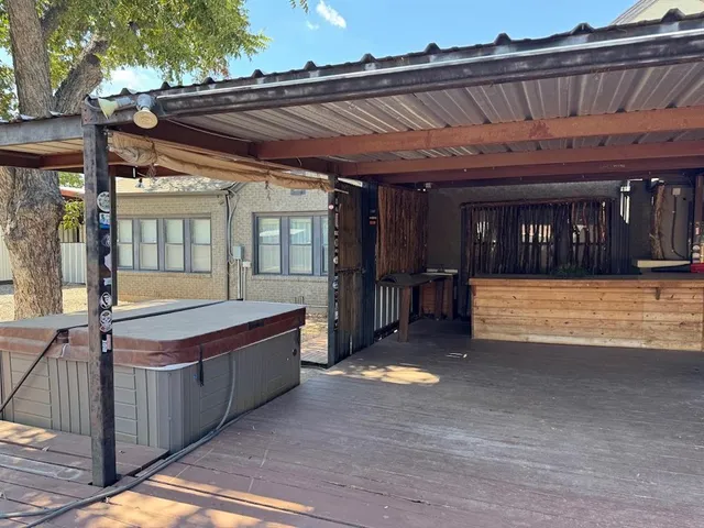 a workspace with furniture and window
